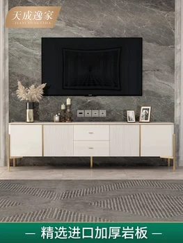Современный роскошный шкаф для телевизора прост, ярок, белоснежен и возвышен. В шкафу для телевизора царит атмосфера высокого класса.